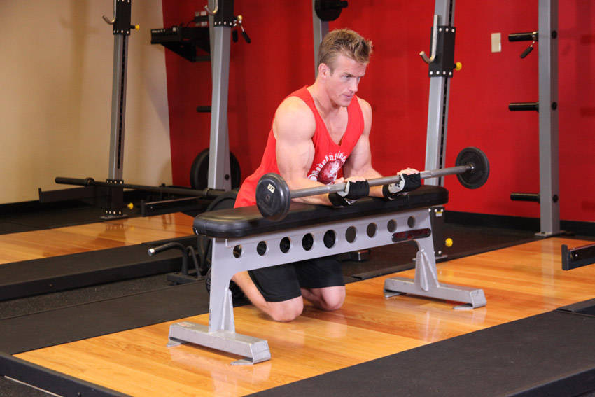 Palms-Up Barbell Wrist Curl Over A Bench